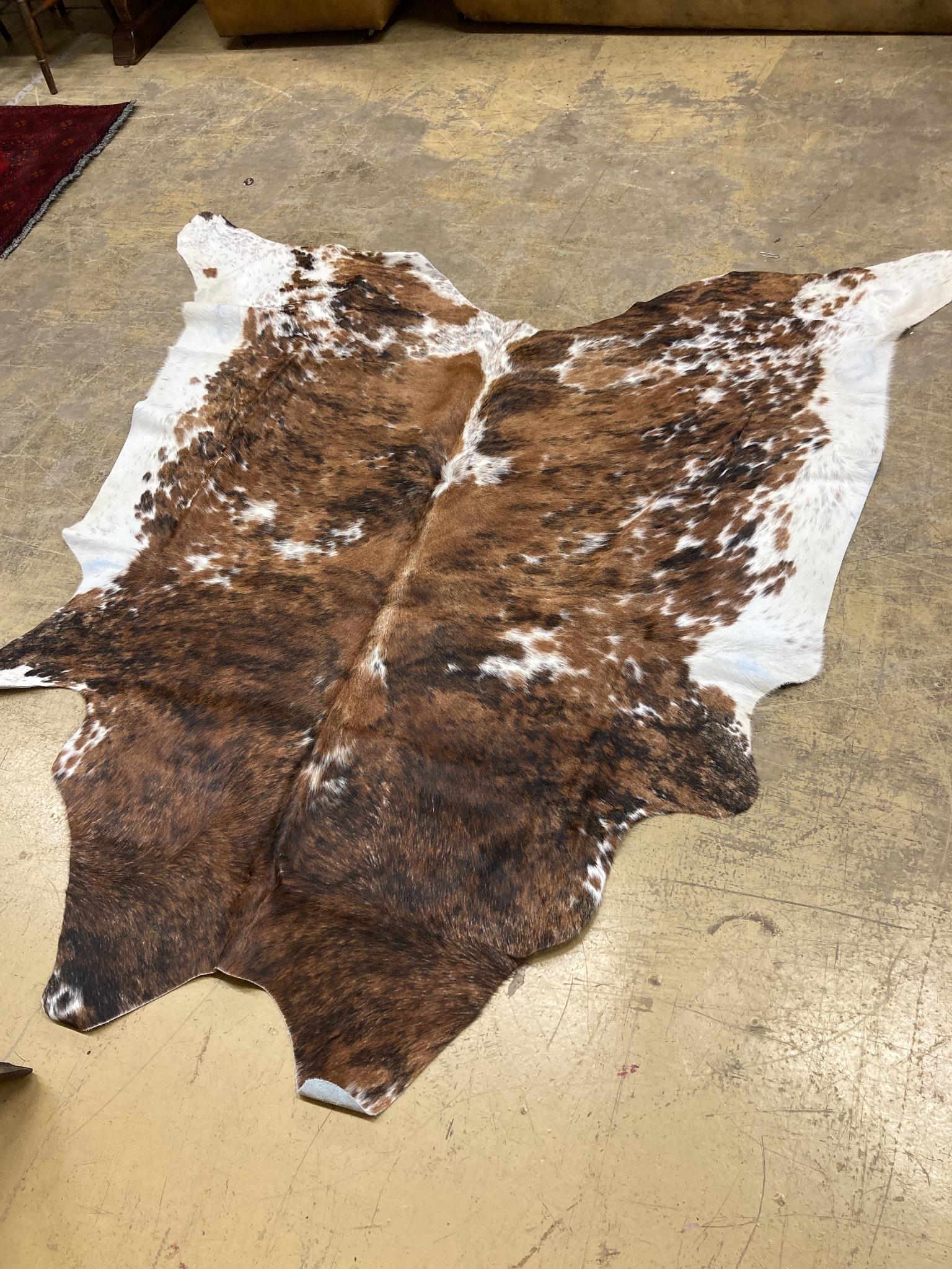 A South American cowhide rug, approx. 170 x 190cm